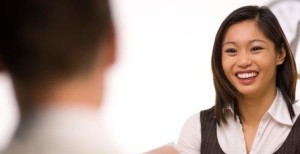 woman smiling in interview 300x154